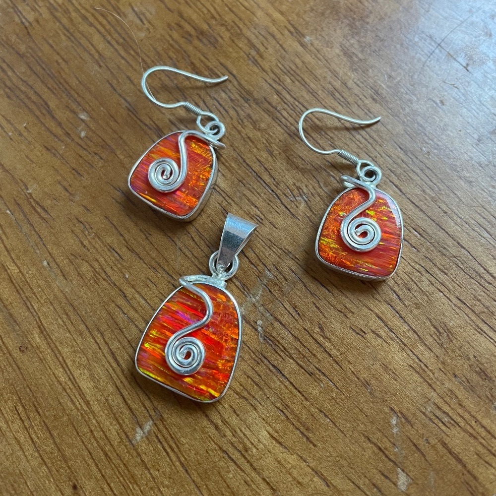 orange swirl fire opal pendant